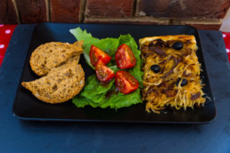 Slice of pissaladiere, a French Riviera specialty